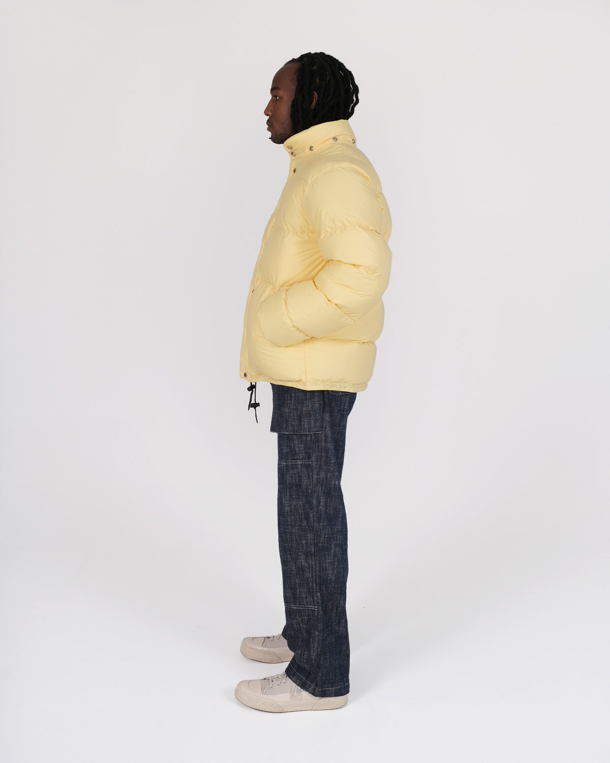 Model wearing the Crescent Down Works &quot;Sun&quot; colorway of the Down Sweater. 