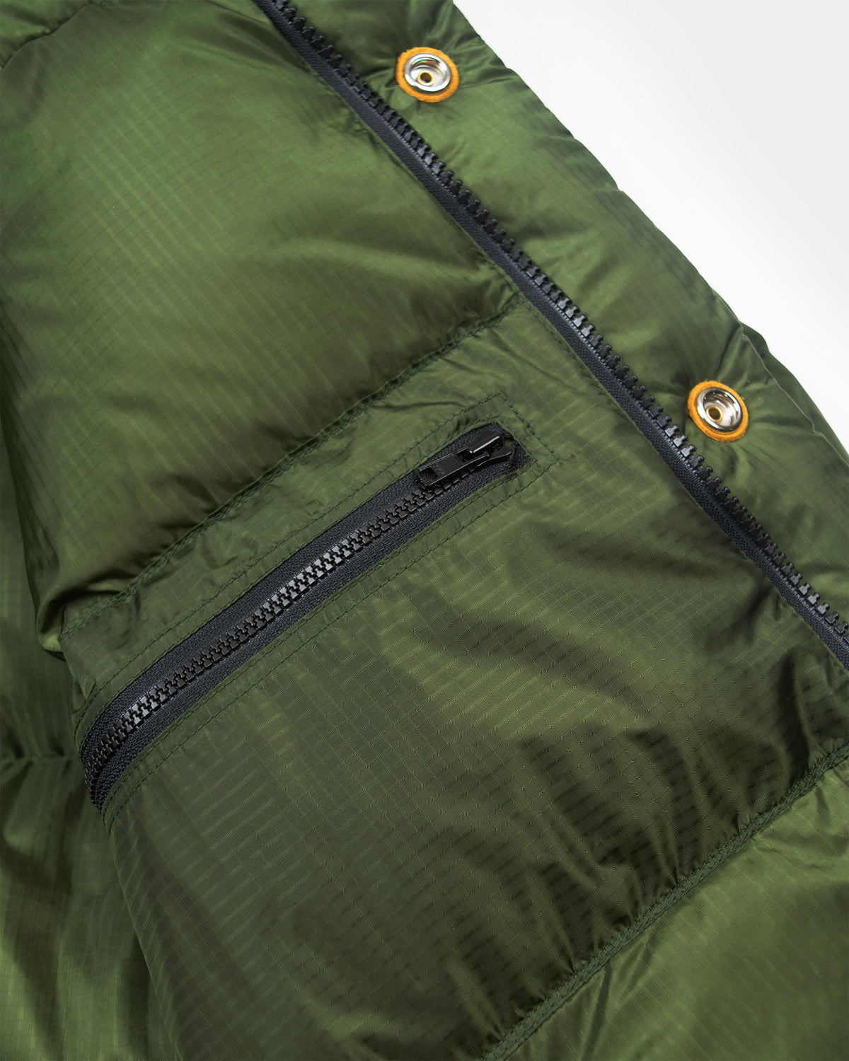 Olive green down sweater puffer jacket with black zipper leather snap reinforcement made of ripstop nylon