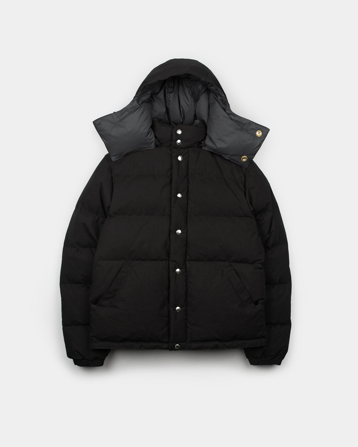 Black down sweater puffer jacket in dry wax cotton with detachable hood and silver-toned buttons