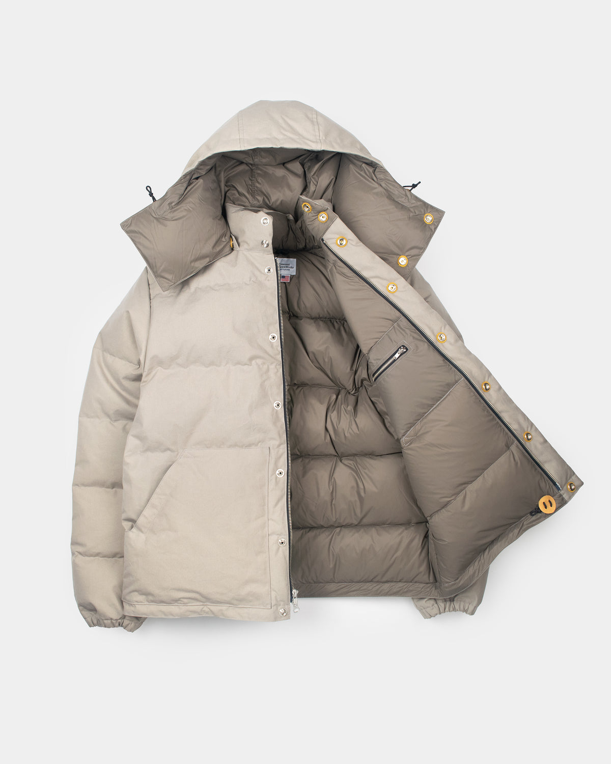 Down sweater puffer jacket with hood leather snap reinforcement quilted dry wax cotton stone color