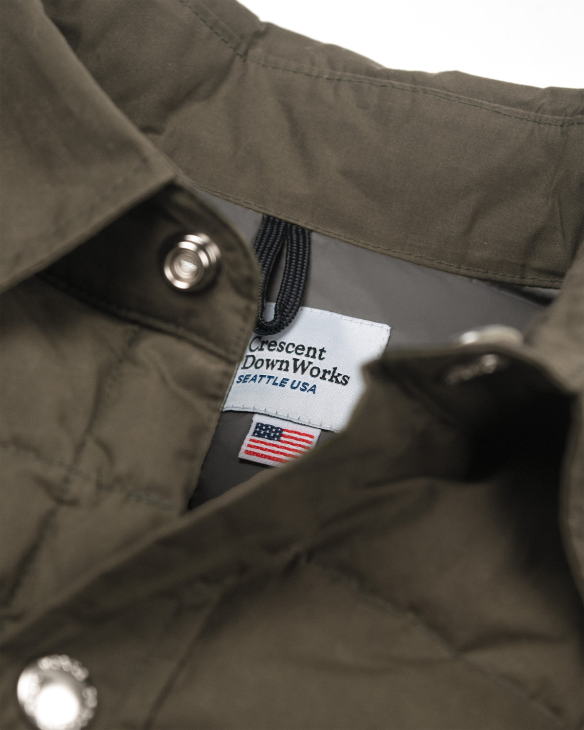 Olive green quilted down shirt dry wax cotton with crescent downworks seattle usa label and american flag emblem