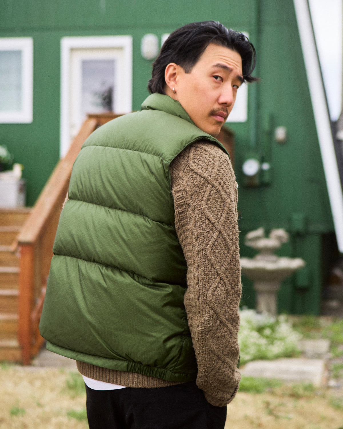 Olive green quilted down italian vest made of ripstop nylon for lightweight warmth and durability