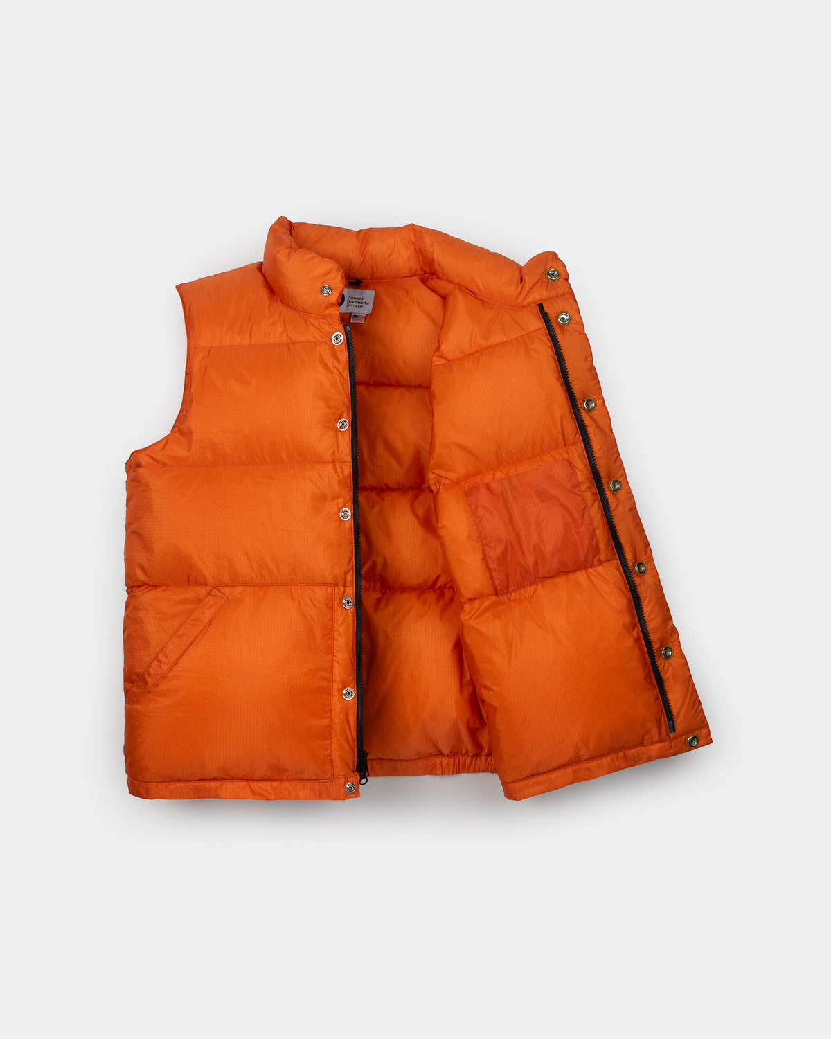 Bright orange down Italian vest made of ripstop nylon with a stand-up collar, front button closure, and side zipper detail