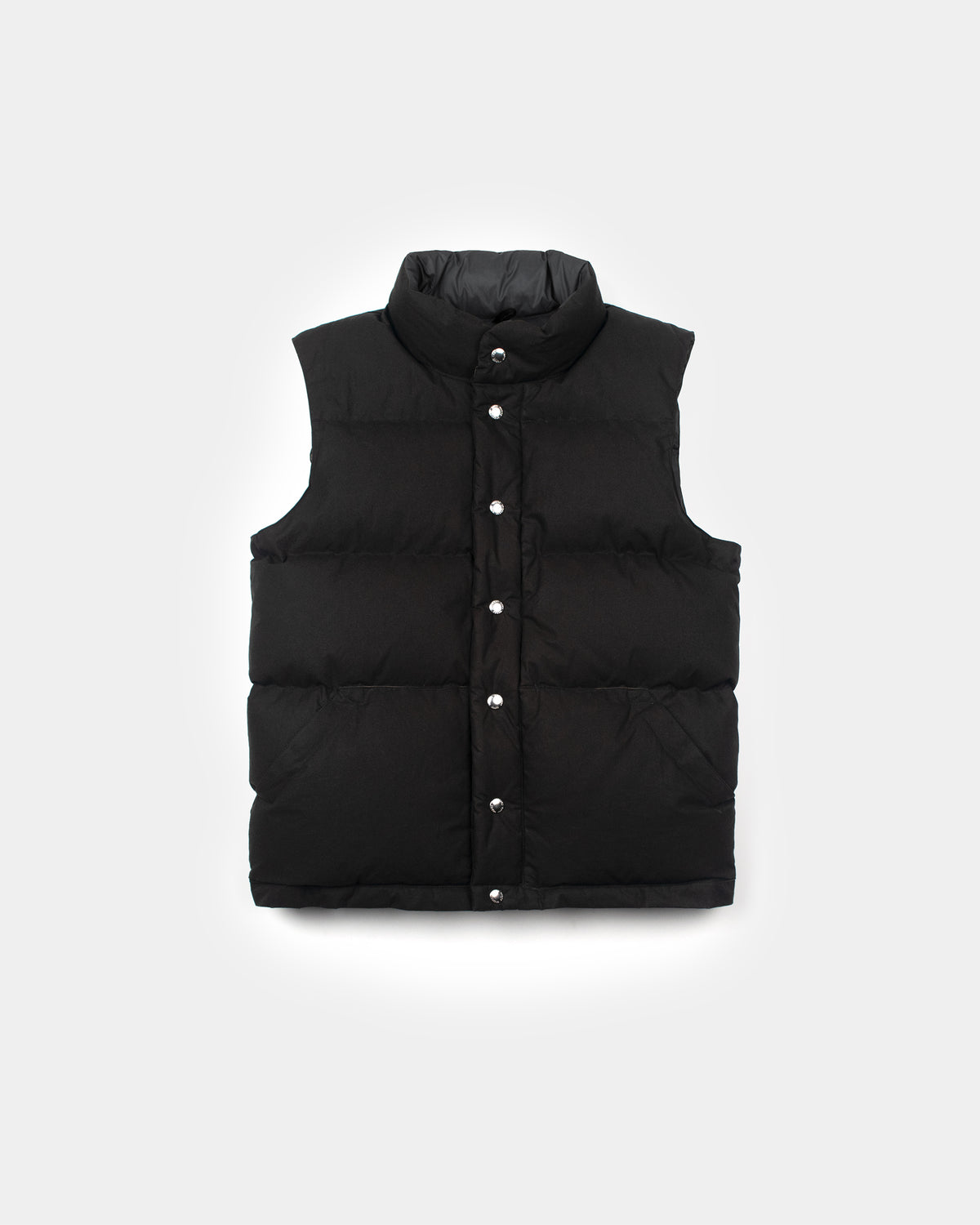 Black quilted down italian vest in dry wax cotton with high collar and silver buttons down the front