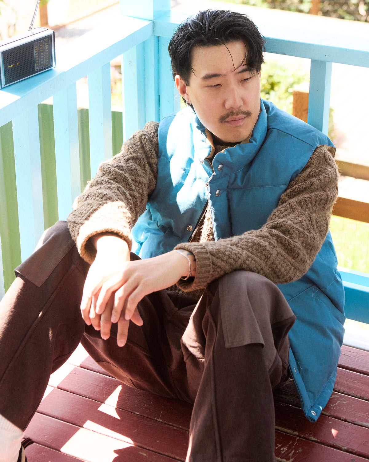 Blue puffer down italian vest  made from dry wax cotton 
