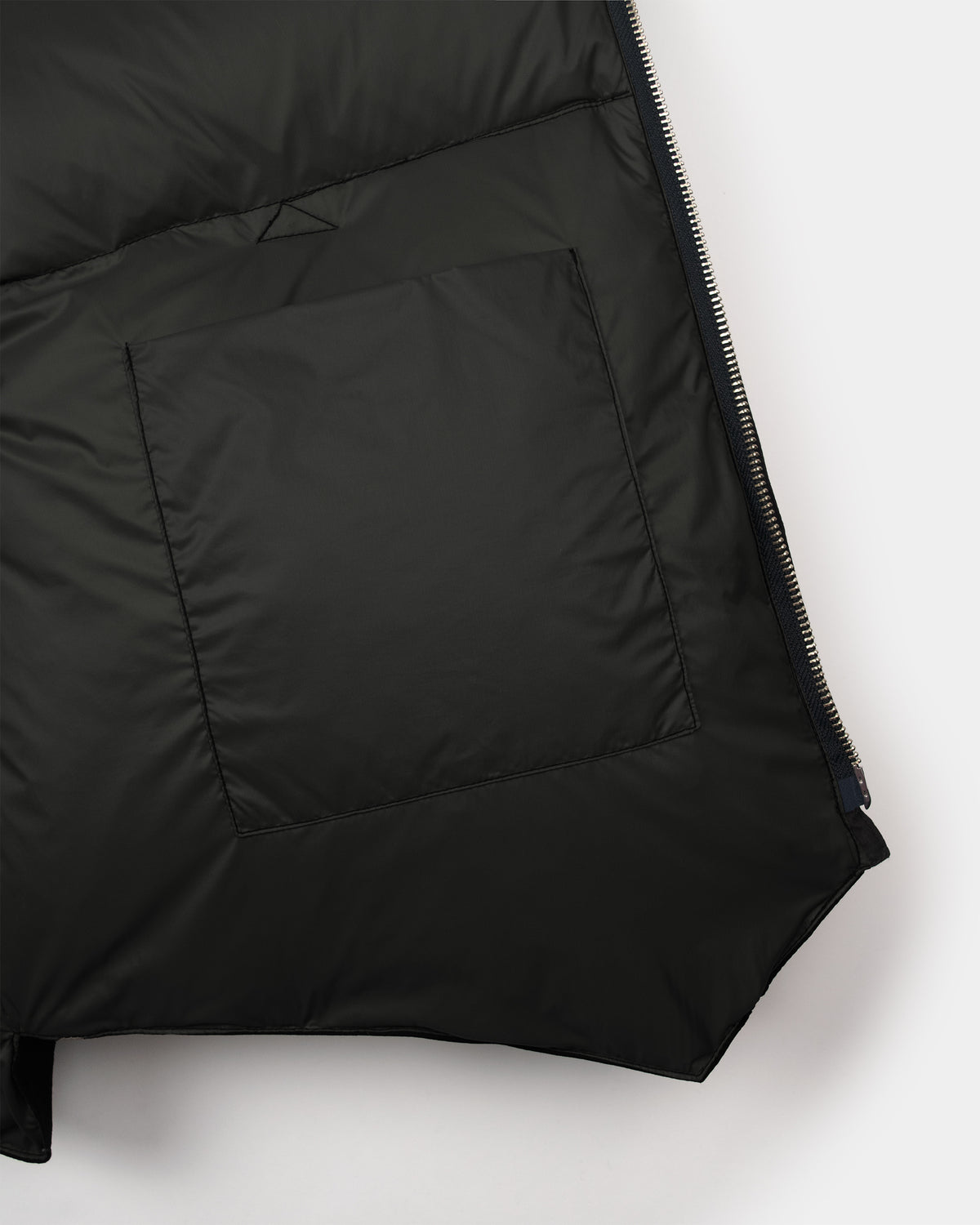 Black North by Northwest quilted puffer vest with front zipper made from dry wax cotton