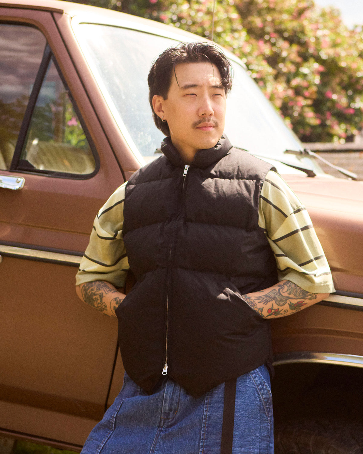 Black quilted puffer vest north by northwest made of dry wax cotton for lightweight warmth and style