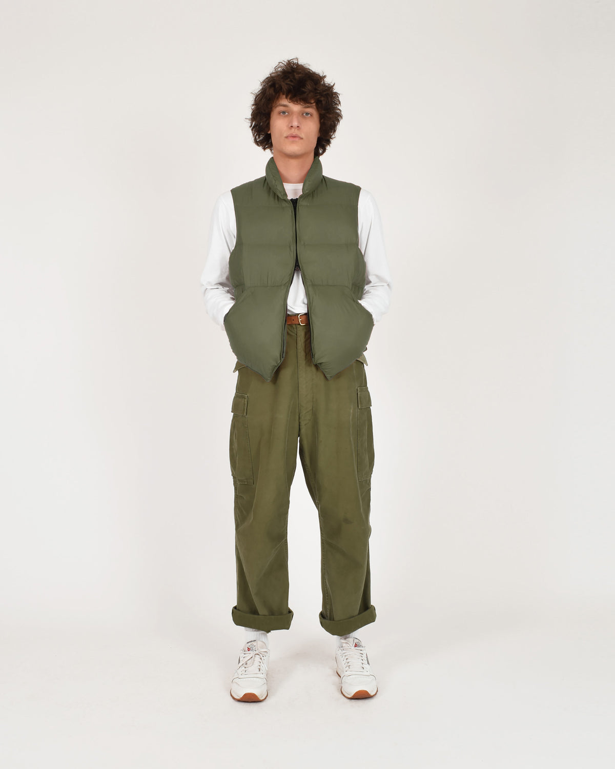 Olive green quilted north by northwest puffer vest made of streakfree nylon for lightweight warmth