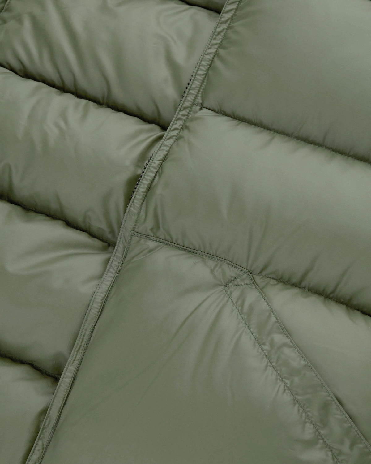 Olive green puffer jacket with quilted stitching and crescent downworks branded label in streakfree nylon