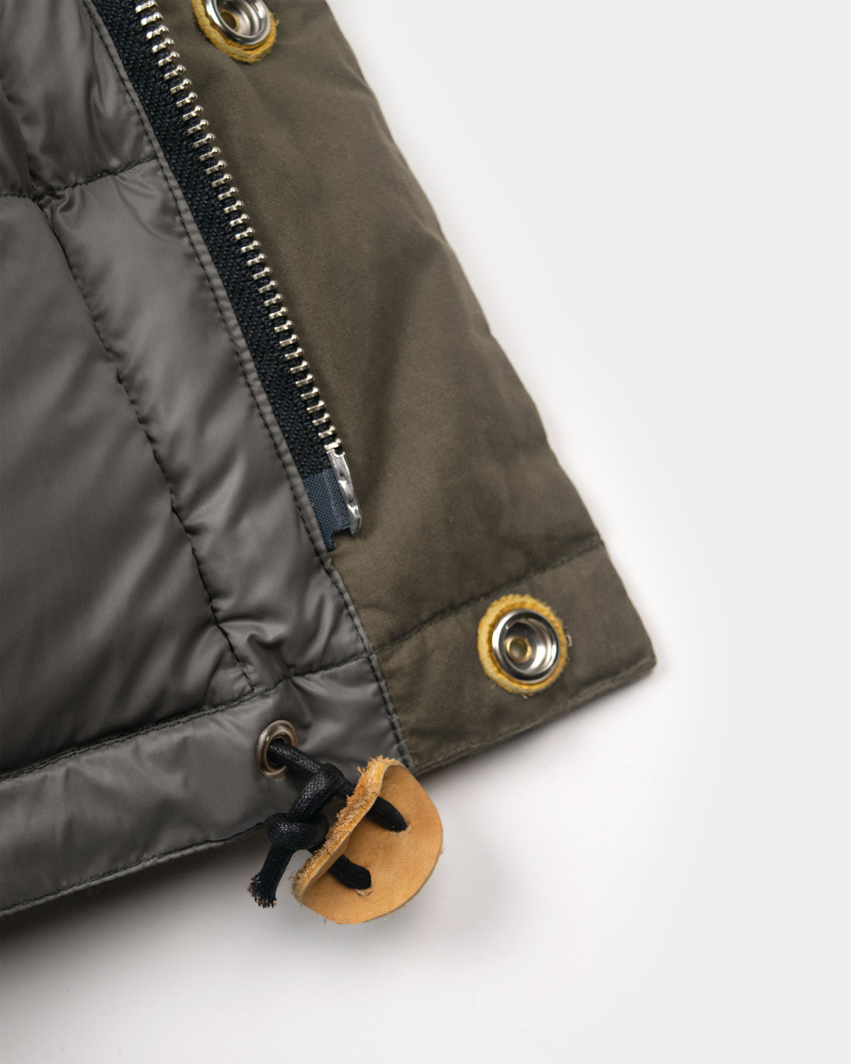 Tent green quilted classico down parka with black zipper tan leather toggle pulls dry waxed cotton 
