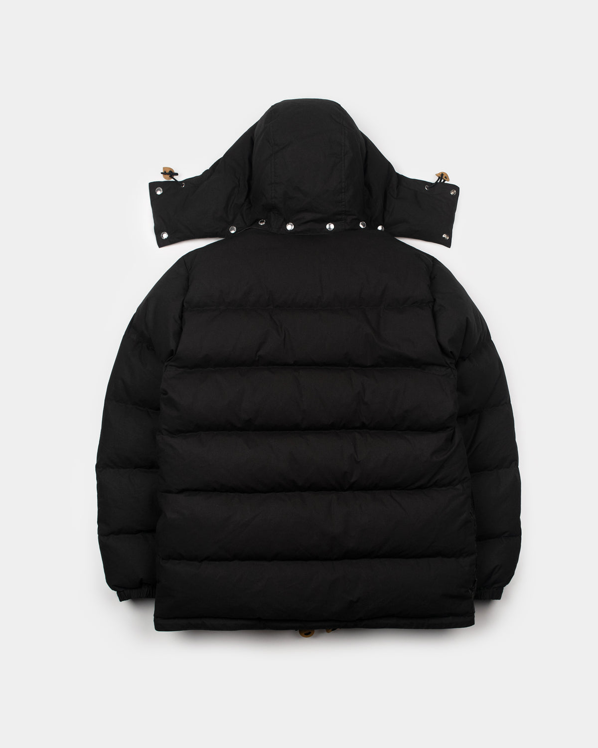 Classico down parka black dry waxed cotton puffer jacket with quilted design and detachable hood with silver snap buttons
