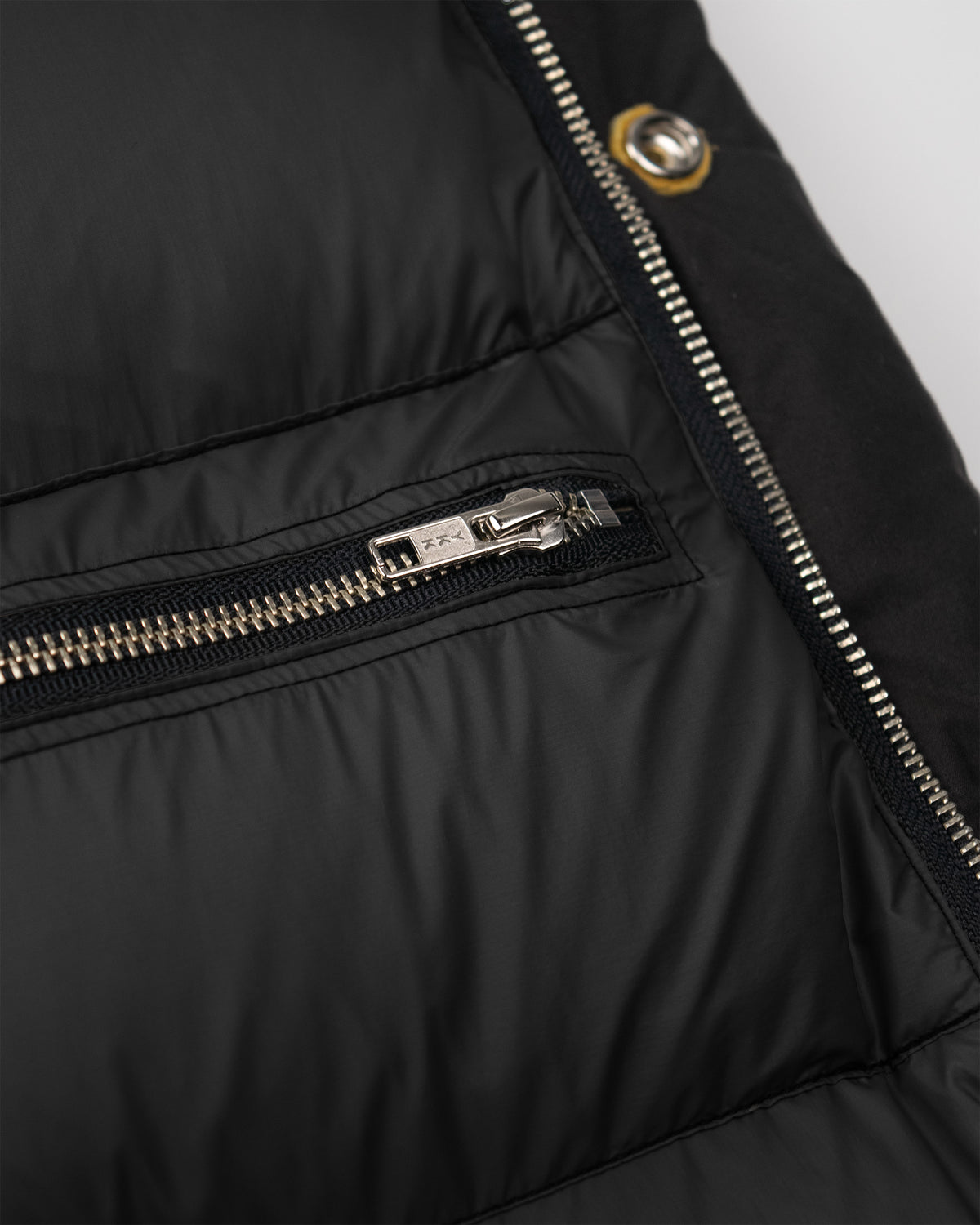 Classico down parka black dry waxed cotton puffer jacket with silver zipper and metallic button detail