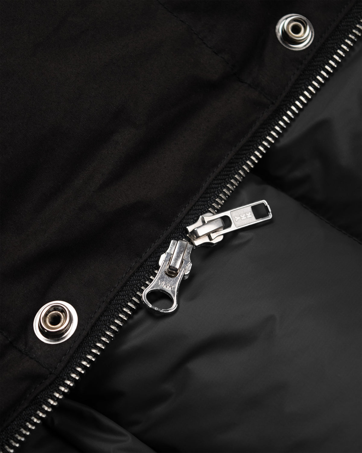 Black classico down parka dry waxed cotton with silver zipper and reinforced snap buttons on front closure