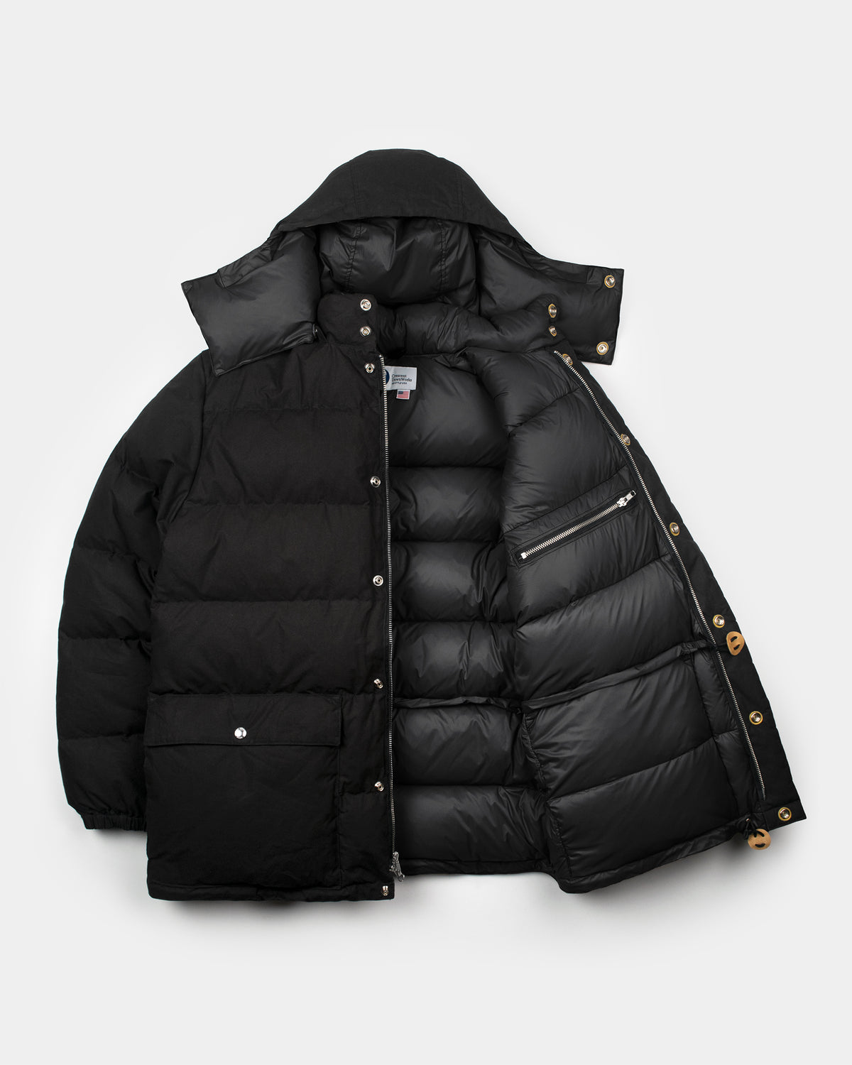 Black classico down parka with hood silver buttons zipper accents made of dry waxed cotton