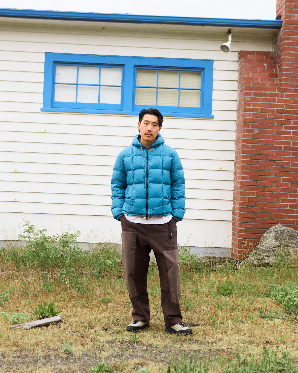 Blue hooded sweatshirt in nylon with duck blue color and black zipper for casual wear