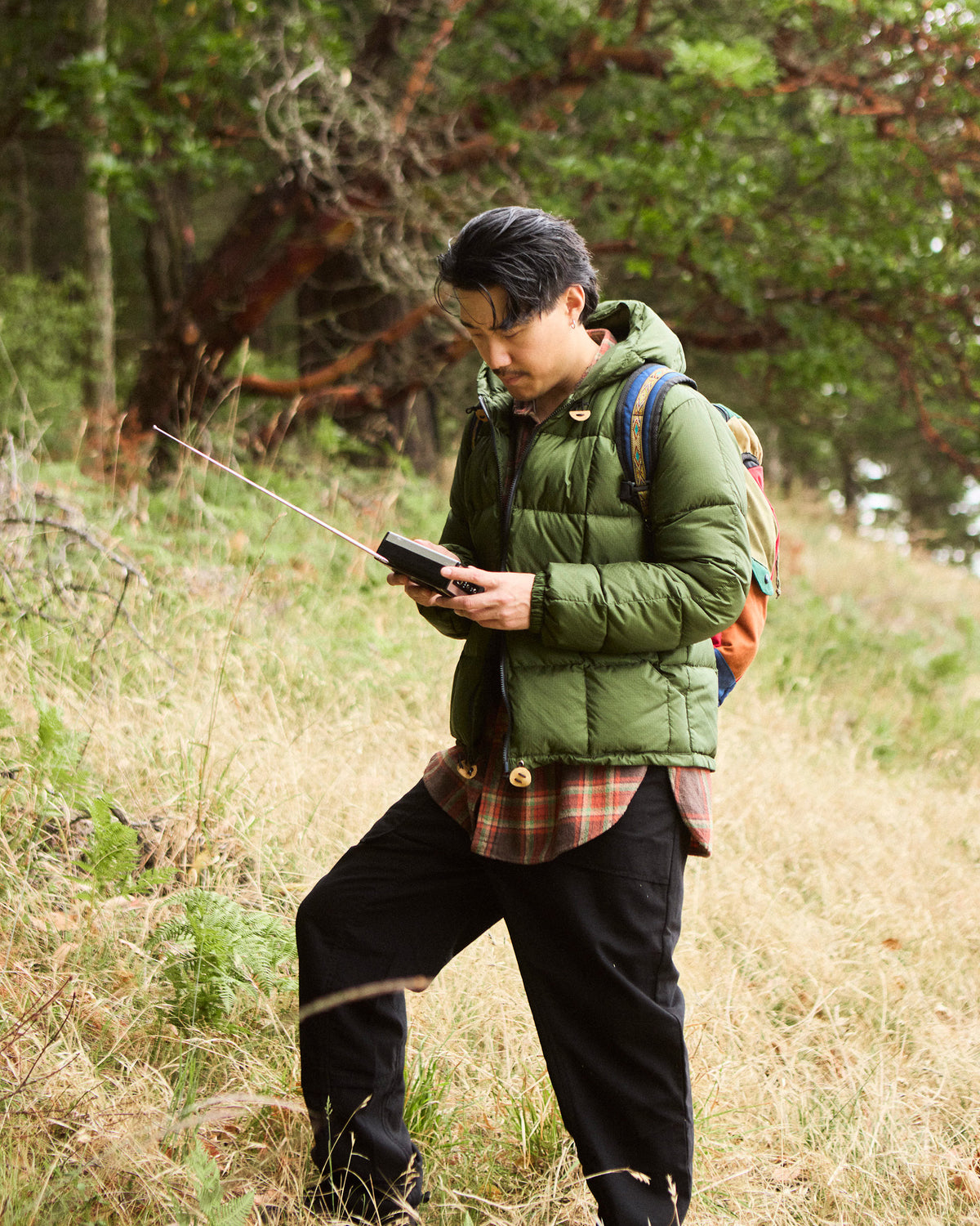 Olive green hooded ripstop nylon jacket