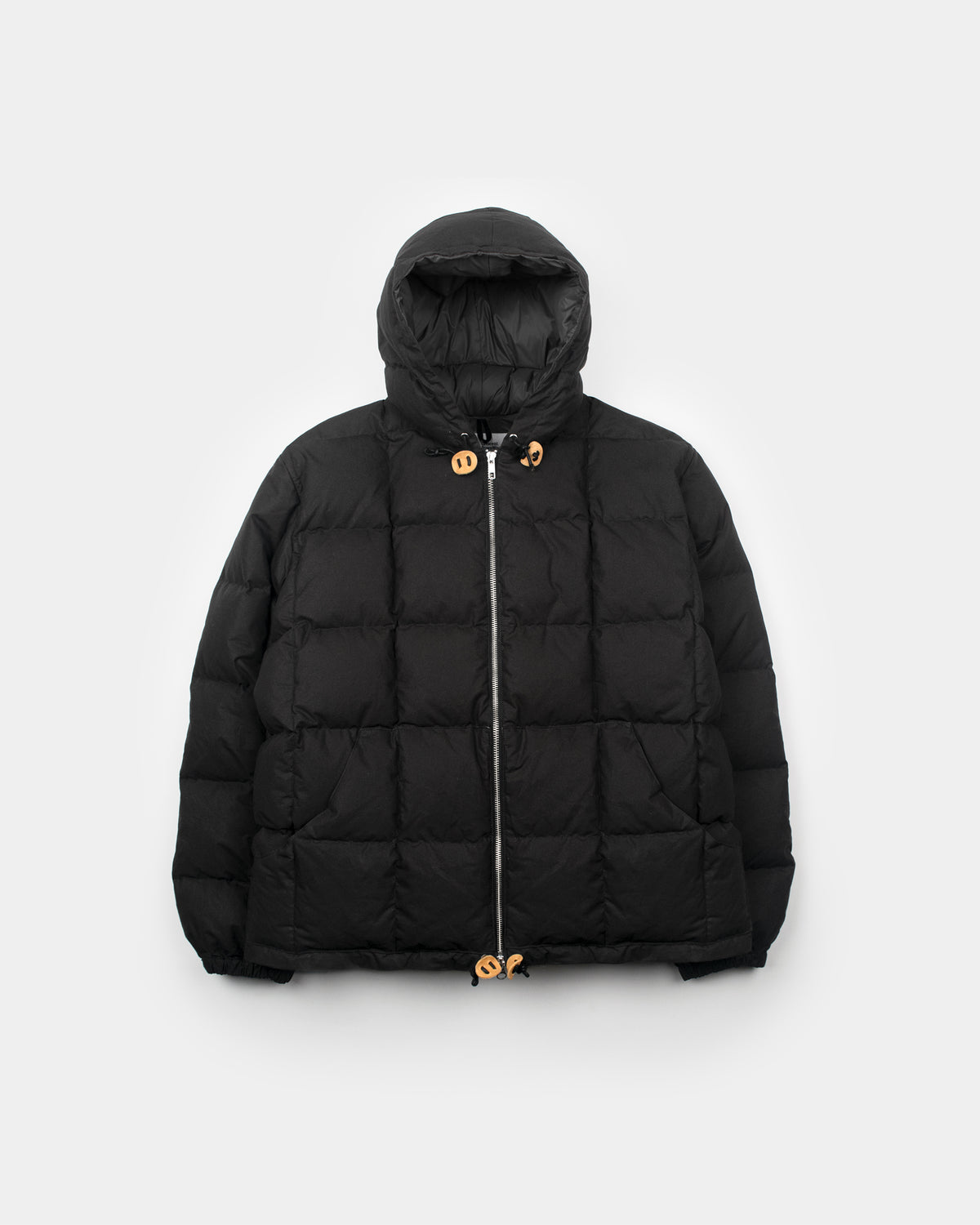 Black quilted puffer hooded sweatshirt in dry wax cotton with leather toggles for cold weather use