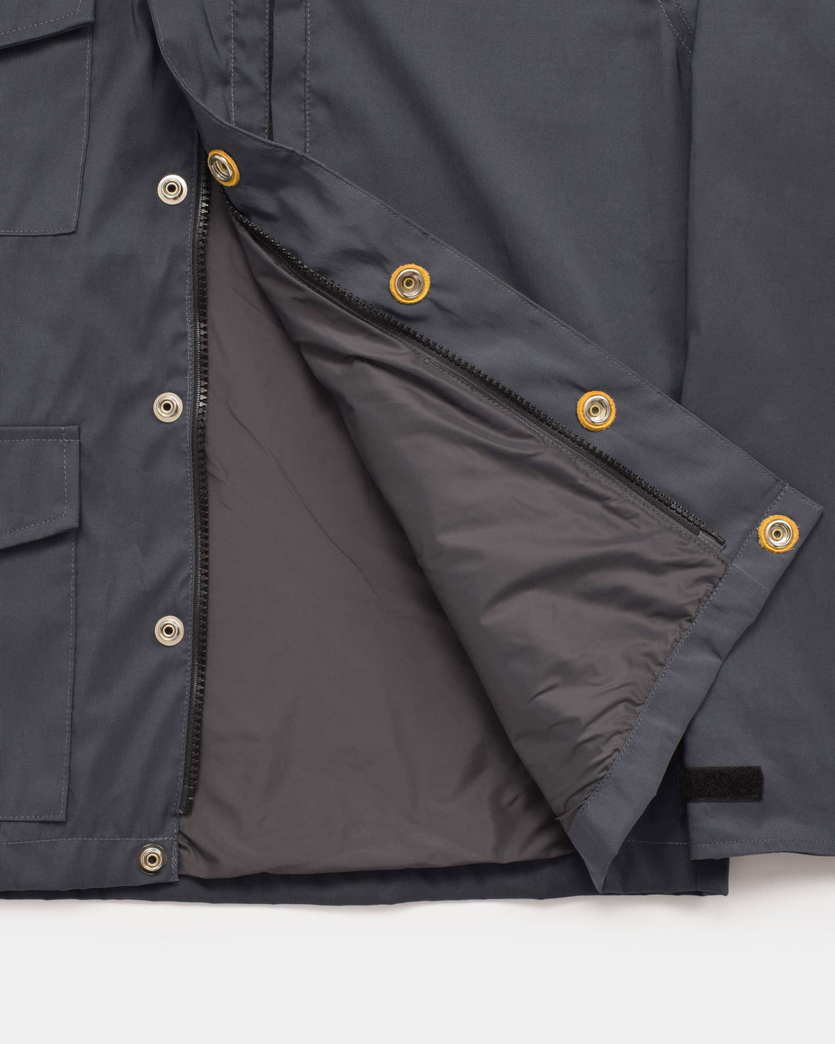 Michi Jacket in Charcoal showing the hem and lining detail