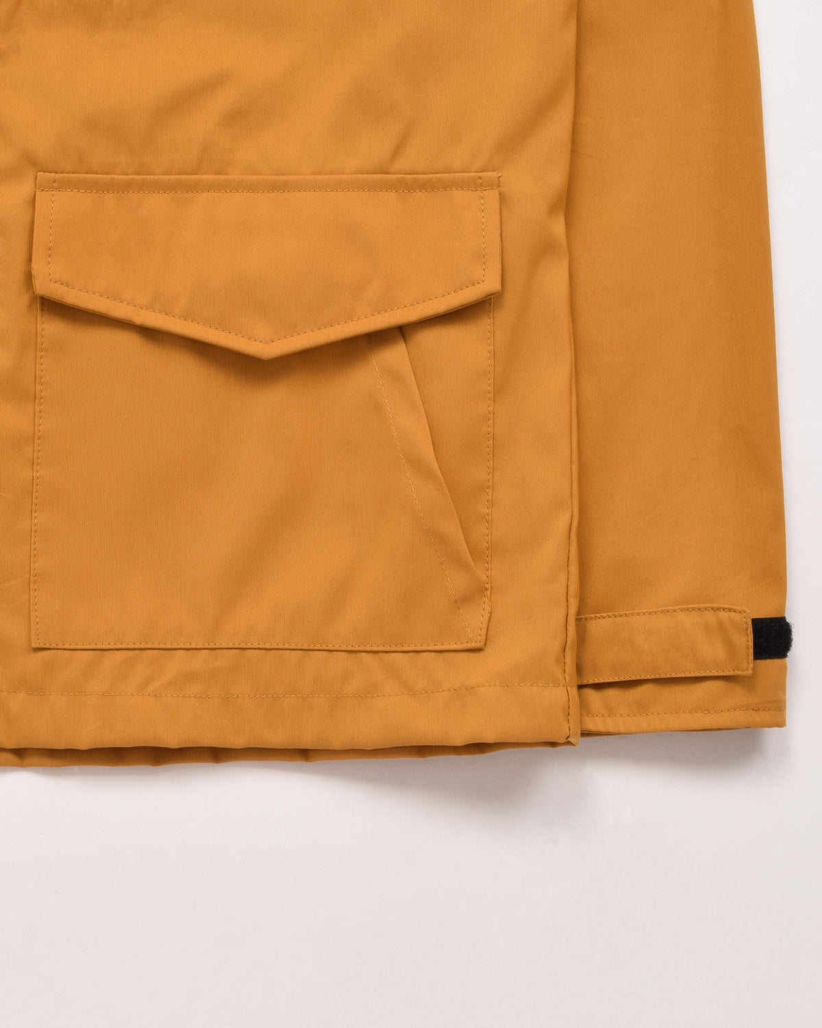 Michi Jacket in Mustard showing lower pocket detail